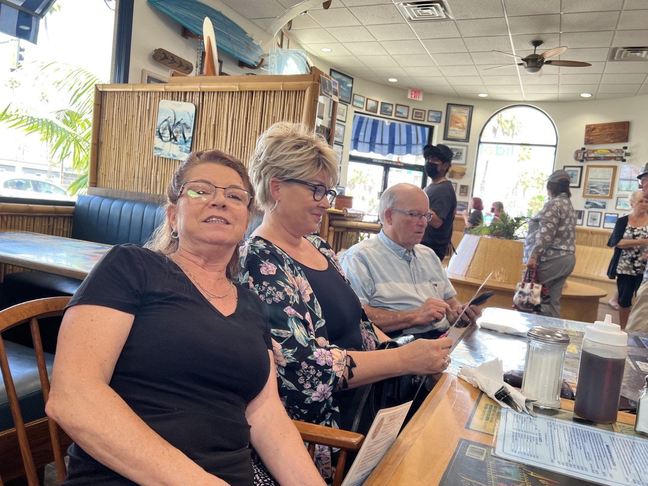 Tandy Owen, Holly Bishop, George Francis order from the menu