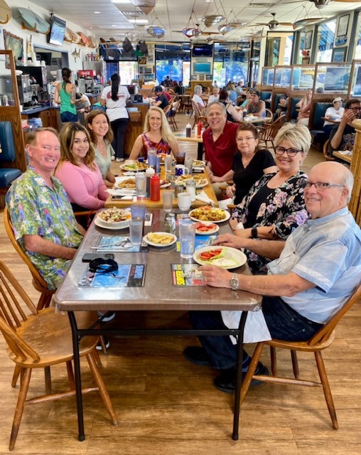 From left to right around the table: Agents Mark Lamb, Vira Rodriguez, Lisa Whitley, Hartford Rep. Sandi Grigg, Morgan Hege, Tandy Owen, Holly Bishop, and George Francis at Beach Break Cafe for lunch with The Hartford Insurance